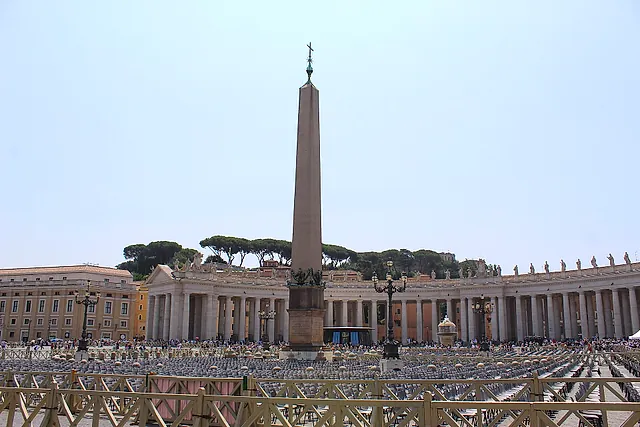 The Egyptian obelisk and one of the fountains in St Peter's Square, with the Basilica facade rising behind them